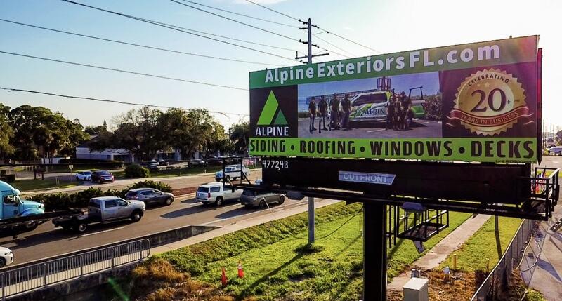 Alpine Exteriors Florida Billboard - Serving Orlando Area with Premium Siding, Roofing, Windows & Decks featuring 20 years celebration and AlpineExteriorsFL.com